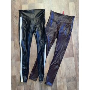 (2) Pair Spanx Faux Leather leggings in black with a white side stripe Medium